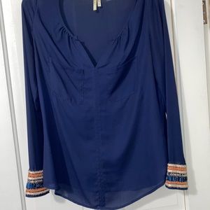 Blue blouse with hand beaded cuff on sleeves. From a vintage shop, worn once.